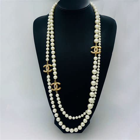 chanel long pearl necklace replica uk|Chanel knockoff pearl necklace.